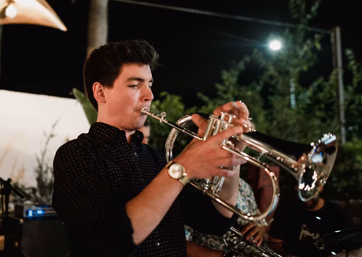 Gabriel Rosenbach playing trumpet on stage